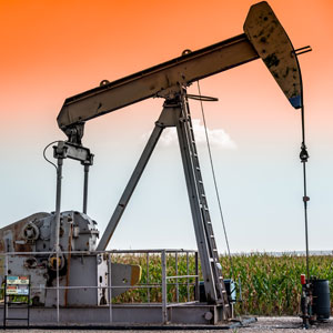 Oil pumpjack operating in Appalachian region, highlighting mineral rights issues.