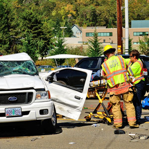 Emergency responders at the scene of a T-bone accident.