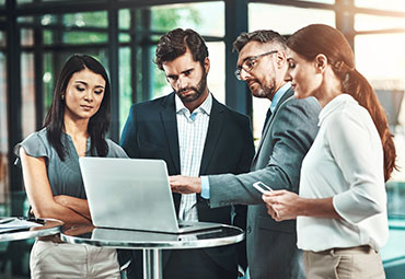 Employment Law – Business professionals discussing workplace policies and legal compliance.